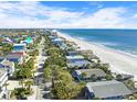 Beautiful aerial view showcasing the neighborhood, beach and ocean at 312 Norris Dr., Pawleys Island, SC 29585