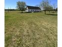 Lovely two-story home with a large lawn and mature trees at 3534 Carter Rd., Loris, SC 29569