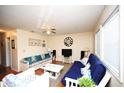 Comfortable living room featuring modern furnishings, lots of seating and bright natural light at 4150 Horseshoe Rd. N # 8, Little River, SC 29566