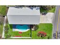 Backyard view featuring pool, green grass, and white fence at 134 Vista Dr., Murrells Inlet, SC 29576