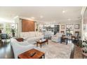 Spacious living room with a comfortable seating area, decorative rug, and access to the kitchen at 135 Chapel Creek Rd. # 41, Pawleys Island, SC 29585