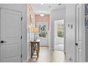 Welcoming entryway with clean lines, neutral colors, and wood-look flooring at 154 Sea Shell Dr. # 16, Murrells Inlet, SC 29576