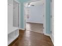 Hallway leading to open room, showcasing tile flooring and white trim at 351 Firenze Loop, Myrtle Beach, SC 29579