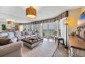 Relaxing living room with ocean views and comfortable seating, perfect for unwinding at 5404 N Ocean Blvd. N # 6-E, North Myrtle Beach, SC 29582