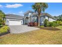 Beautiful single-story home boasts an attached two car garage and large driveway at 8504 Juxa Dr., Myrtle Beach, SC 29579