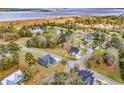 Aerial view of a neighborhood with beautiful homes and waterfront views at 529 Oak Lawn Rd., Georgetown, SC 29440