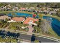 Beautiful aerial view of the home situated on a waterfront lot with lush landscaping and views of a scenic pond at 7268 Seville Dr., Myrtle Beach, SC 29572