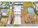 Charming coastal home with a long private driveway and a beautiful manicured yard at 318 Vista Dr., Murrells Inlet, SC 29576