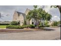Beautiful two-story house with manicured landscaping and a spacious yard at 4603 Arran Ct. # C, Myrtle Beach, SC 29579