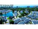 Stunning aerial view of a waterfront property in North Myrtle Beach, showcasing the community's prime location and water access at 703 S 1St Ave. S # 34D, North Myrtle Beach, SC 29582