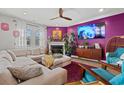 Inviting living room with a comfortable sectional, modern decor, and a focal point fireplace at 1210 Harbison Circle, Myrtle Beach, SC 29579