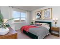 Bright bedroom with a view, featuring stylish decor and a comfortable queen-sized bed at 1451 Nokota Dr., Conway, SC 29526