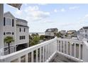 Beautiful coastal view from a porch with neighboring beach homes at 412 Seaside Dr. S, Surfside Beach, SC 29575