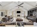 Inviting living room featuring a fireplace, vaulted ceiling, and comfortable seating at 5825 Peachtree Rd., Myrtle Beach, SC 29588