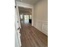 Bright living room with hard wood floors and ample natural light from a glass door at 242 River Edge Dr., Myrtle Beach, SC 29588