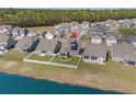 Aerial view showing the property's location in a peaceful community near a lake at 852 Harrison Mill St., Myrtle Beach, SC 29579