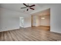 Bright, open living room featuring wood-look floors, recessed lights, and a ceiling fan at 204 Rosewater Loop, Myrtle Beach, SC 29588
