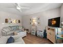 Inviting living room featuring neutral tones, ceiling fan and stylish decor at 323 14Th Ave. S # B, Surfside Beach, SC 29575
