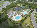 Aerial view of community amenities including pool, clubhouse, tennis and parking at 5012 Prato Loop # 5012, Myrtle Beach, SC 29579