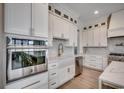 Bright, fully equipped kitchen with stainless steel appliances, gold fixtures, and ample cabinet space at 804 Waterton Ave., Myrtle Beach, SC 29579