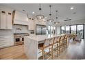 Modern kitchen features a large island with seating and stainless steel appliances at 804 Waterton Ave., Myrtle Beach, SC 29579