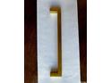 Close-up of a modern gold cabinet handle; a stylish accent for any kitchen or bathroom remodel at 1397 Knotty Branch Rd., Conway, SC 29527