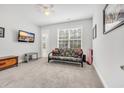 Comfortable bedroom with carpet flooring, ceiling fan, and ample natural light at 1478 Suncrest Dr., Myrtle Beach, SC 29577