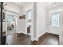 Hallway featuring hardwood floors, neutral paint, and access to bedroom and living spaces at 1478 Suncrest Dr., Myrtle Beach, SC 29577