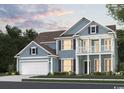 Beautiful two-story home with a spacious garage and inviting curb appeal with a second story porch at 515 Oak Landing Dr., Myrtle Beach, SC 29588
