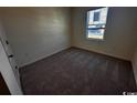 Inviting bedroom with soft carpeting and natural light from a window at 623 Castillo Dr., Loris, SC 29569