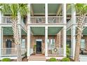 Stunning exterior view showcasing brick facade, grand balconies and a welcoming entrance at 2790 Howard Ave. # D, Myrtle Beach, SC 29577