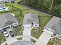 An aerial view of the home with a well-maintained yard and neighborhood at 2904 Lunar Ct., Myrtle Beach, SC 29577