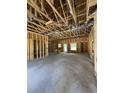 Unfinished interior showcases the home's framing, windows, and open layout at 4028 Copperhead Rd., Conway, SC 29527
