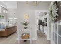 Stylish foyer featuring modern decor with a glimpse into a bright kitchen and comfortable living area at 441 Garden Ave., Georgetown, SC 29440