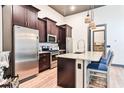 Modern kitchen features stainless steel appliances, granite countertops and a large center island with seating at 72 Landing Rd. # 0, Pawleys Island, SC 29585