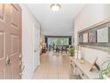 Inviting entryway leading to a spacious living area with tile flooring and natural light at 111 Hickory Dr., Conway, SC 29526