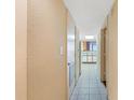 Bright hallway leading to a kitchen with views of the ocean at 1604 N Ocean Blvd. # 903, Myrtle Beach, SC 29577