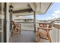 Outdoor seating with a table and two chairs is available on the spacious balcony at 1801 N Ocean Blvd. # O-4, North Myrtle Beach, SC 29582