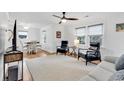 Well-lit living room featuring hardwood floors and ample seating at 313 73Rd Ave. N, Myrtle Beach, SC 29572