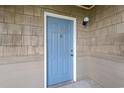 A blue painted door with a gold door knocker and unit number D at 380 Myrtle Greens Dr. # D, Conway, SC 29526