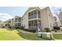 Exterior of condos with lovely screened in porch overlooking the landscaping at 6207 Sweetwater Blvd. # 6207, Murrells Inlet, SC 29576