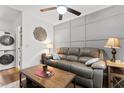 Cozy living room with modern decor, a comfortable couch, and stylish wall art at 610 Putters Ln. # H-109, Little River, SC 29566