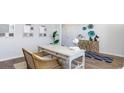 Stylish office featuring a decorative desk, chair, and unique wall art at 5159 Yellowstone Dr., Conway, SC 29526
