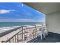 Balcony overlooking beautiful ocean views, perfect for relaxation and enjoying the coastal scenery at 1105 S Ocean Blvd. # 502, Myrtle Beach, SC 29577