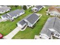 Aerial view of a home with a well-kept lawn and neighborhood, showcasing its location at 1130 Ganton Way, Myrtle Beach, SC 29588