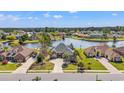 Stunning aerial view of home nestled on a waterfront property with lush landscaping and serene water views at 2039 Woodburn Dr., Myrtle Beach, SC 29579