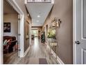 Long hallway with decor and doors leading to other rooms at 3613 Pitchers Pl., Little River, SC 29566