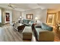 Comfortable living room with plush seating, stylish decor, and open access to other rooms at 9994 Beach Club Dr. # 408, Myrtle Beach, SC 29572