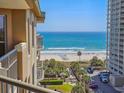 Beautiful beach view from the condo with ocean and blue sky and view of the boardwalk and beach at 9994 Beach Club Dr. # 706, Myrtle Beach, SC 29572