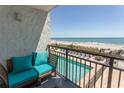 Relax on this balcony with a partial ocean view near the pool and enjoy the sounds of the beach at 2001 S Ocean Blvd. # 207, Myrtle Beach, SC 29577